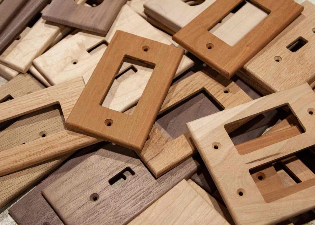 assorted wood outlet covers and wood light switch covers